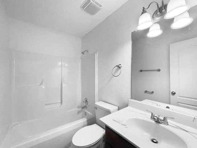 full bathroom featuring shower / bathing tub combination, vanity, and toilet