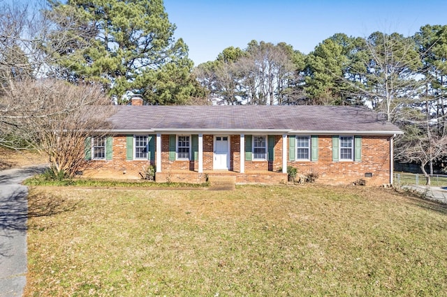 ranch-style house with a front lawn