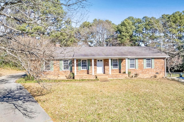 ranch-style house featuring a front lawn