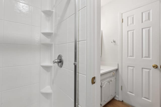 bathroom featuring vanity and walk in shower