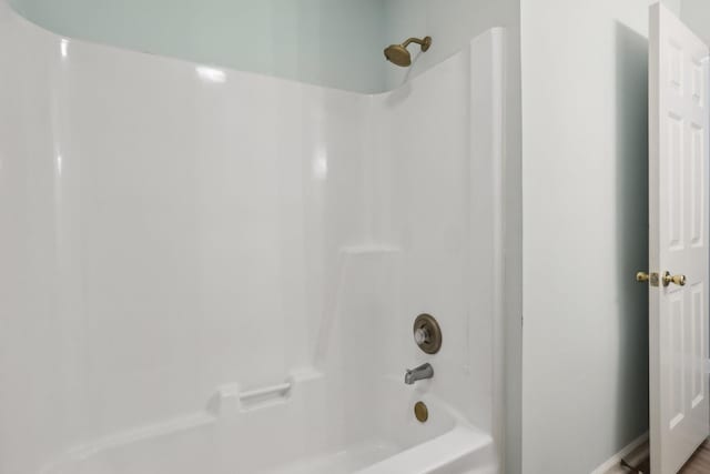 bathroom featuring bathing tub / shower combination