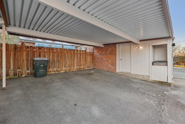 exterior space with a carport