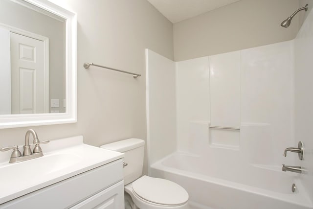 full bathroom featuring toilet,  shower combination, and vanity