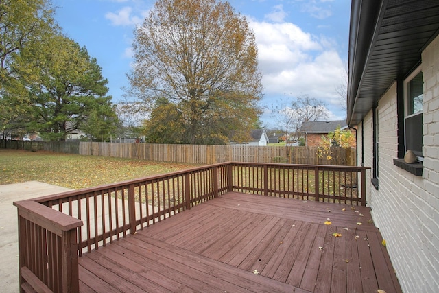 wooden deck with a yard