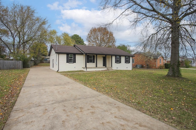 single story home with covered porch and a front lawn