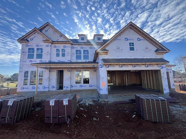 property under construction with covered porch