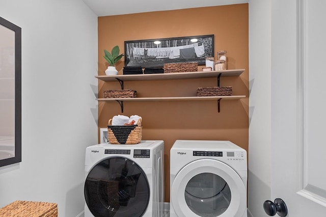 laundry room with separate washer and dryer