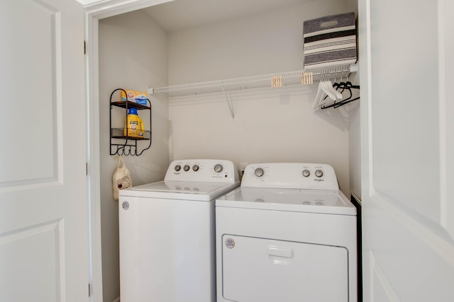 laundry area with washer and dryer