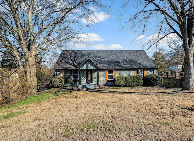 view of front of property with a front lawn