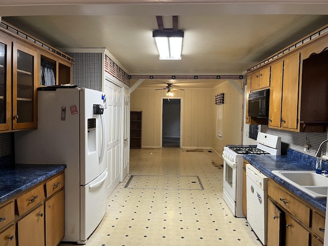 kitchen with ceiling fan, sink, and white appliances