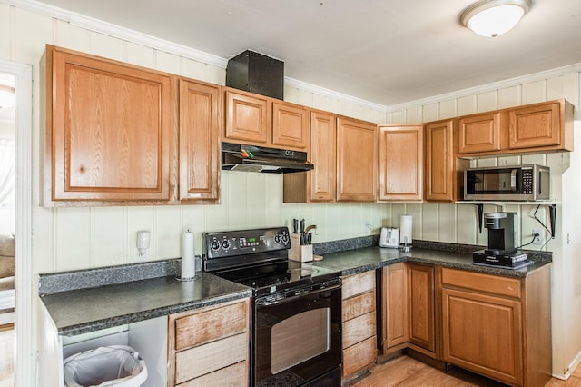 kitchen featuring electric range, light wood-type flooring, and crown molding