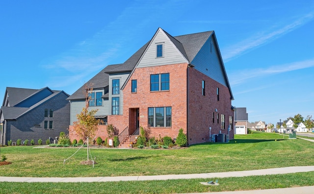 view of front of house with a front yard and cooling unit