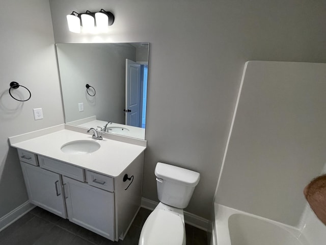 full bathroom featuring toilet, tub / shower combination, tile patterned floors, and vanity