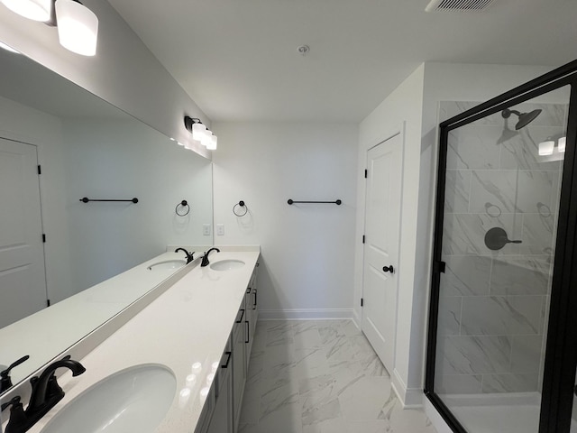 bathroom featuring an enclosed shower and vanity