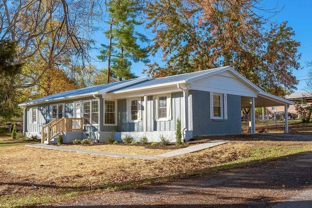 view of front of house featuring a carport