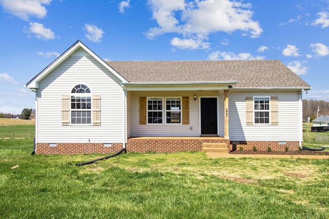 ranch-style house featuring a front yard