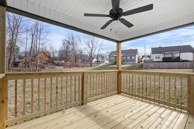 wooden deck with ceiling fan