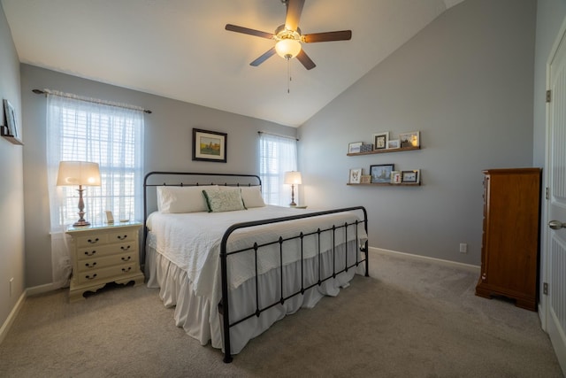 carpeted bedroom featuring ceiling fan and lofted ceiling