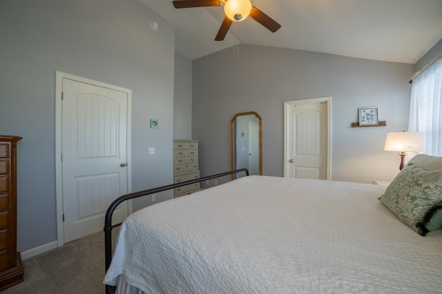 bedroom featuring vaulted ceiling, ceiling fan, and carpet