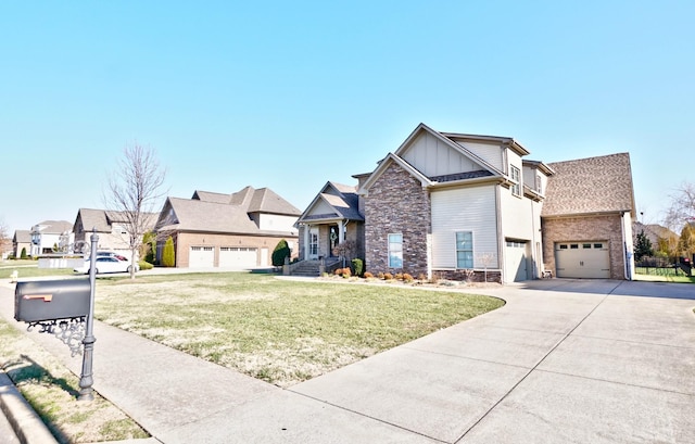 view of front facade featuring a front yard and a garage