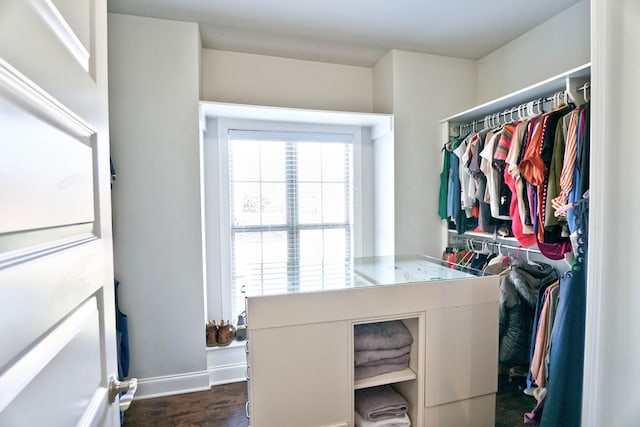 laundry area featuring dark hardwood / wood-style floors