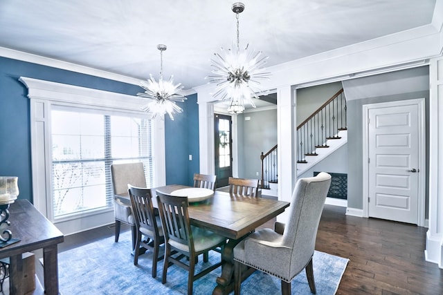 dining space featuring a notable chandelier, crown molding, and dark hardwood / wood-style flooring