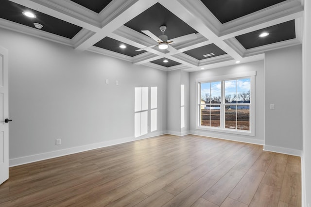 unfurnished room featuring coffered ceiling, crown molding, beamed ceiling, ceiling fan, and hardwood / wood-style flooring