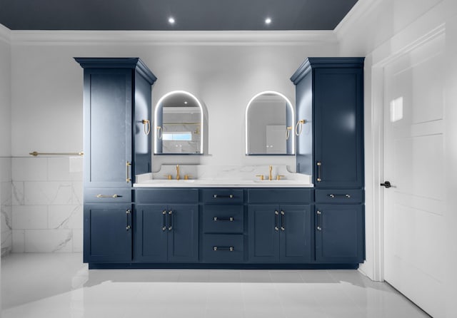 bathroom featuring ornamental molding, tile patterned floors, and vanity