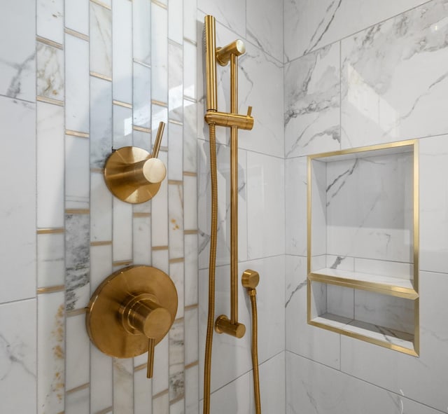 room details with a tile shower