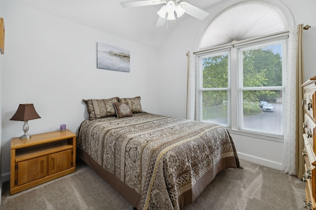 bedroom with ceiling fan and light carpet