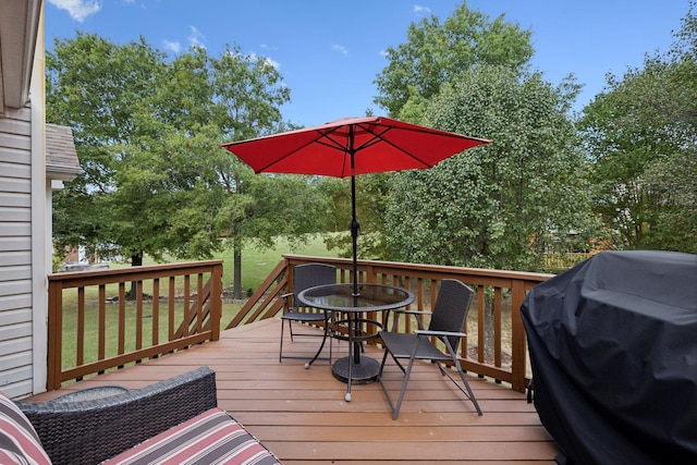 wooden deck with grilling area