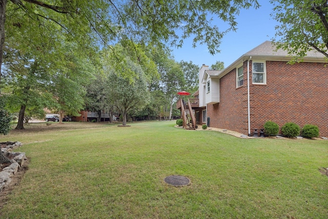 view of yard with a deck