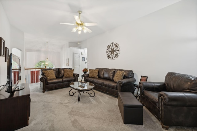 living room featuring light colored carpet and ceiling fan