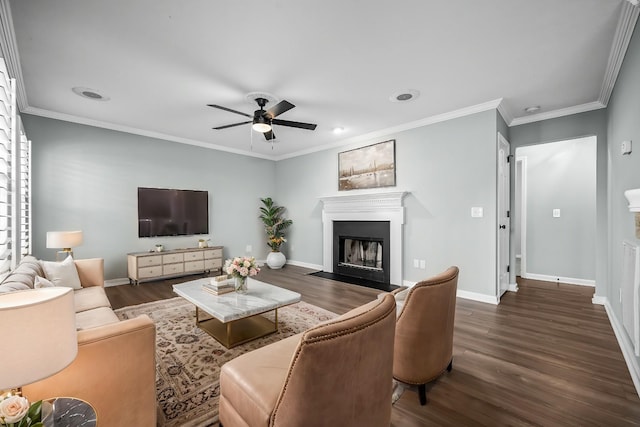 living room featuring ceiling fan, crown molding, and dark hardwood / wood-style floors