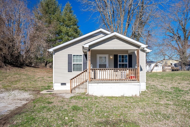 bungalow-style home with a porch and a front lawn