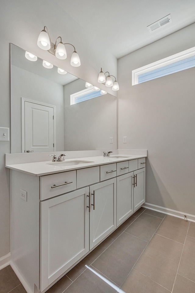 bathroom featuring vanity and tile patterned flooring