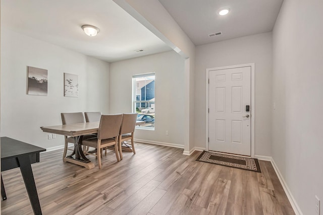 dining room featuring hardwood / wood-style flooring