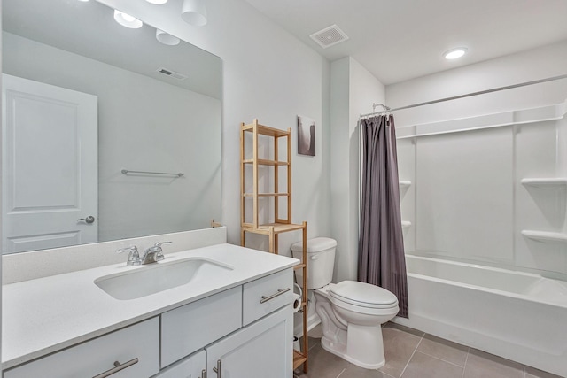 full bathroom featuring toilet, vanity, tile patterned floors, and shower / bath combination with curtain