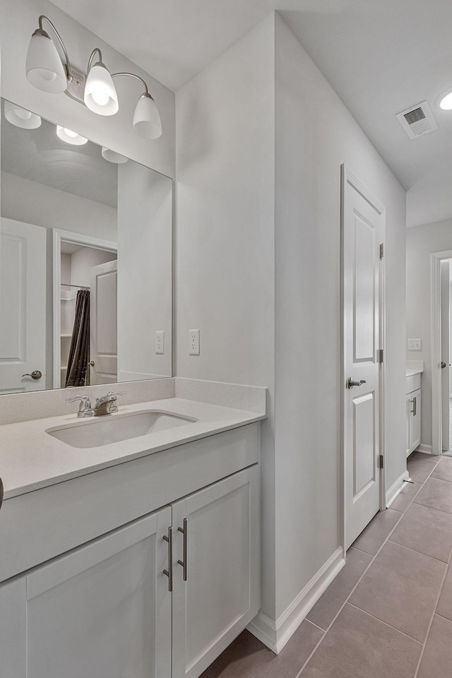 bathroom featuring vanity and tile patterned floors