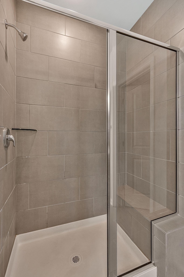 bathroom featuring an enclosed shower