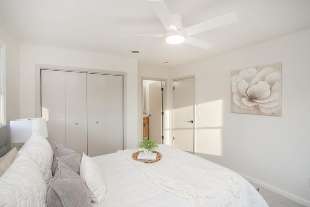 bedroom featuring carpet flooring, ceiling fan, and a closet