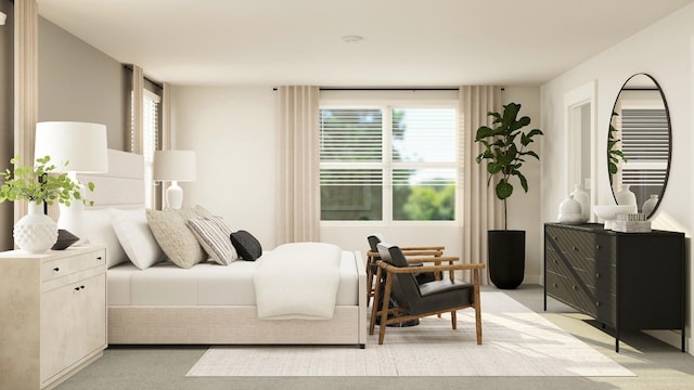 bedroom with light carpet and multiple windows