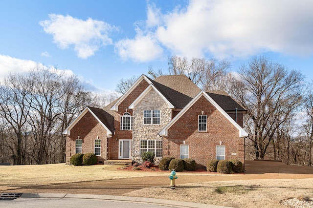 view of property featuring a front yard