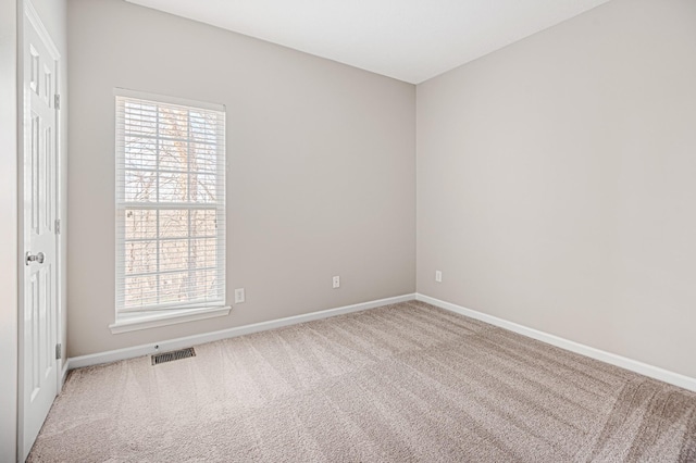 view of carpeted spare room