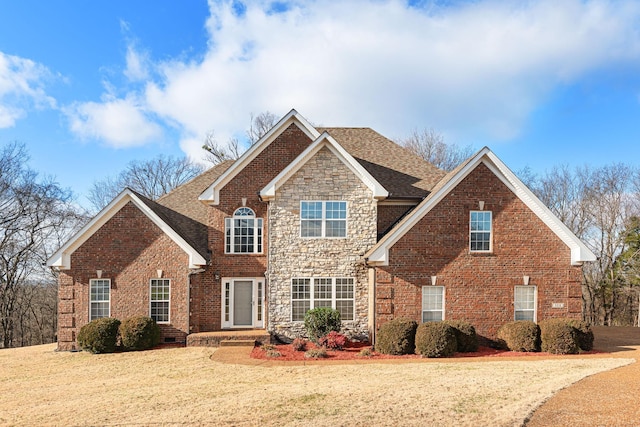 front facade with a front lawn