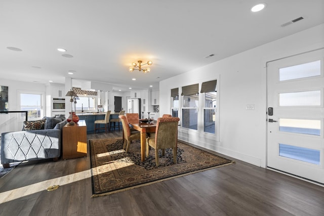 dining room featuring dark hardwood / wood-style floors