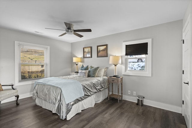 bedroom with dark wood-type flooring and ceiling fan