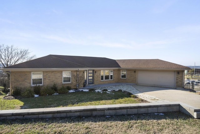 single story home with a front lawn and a garage