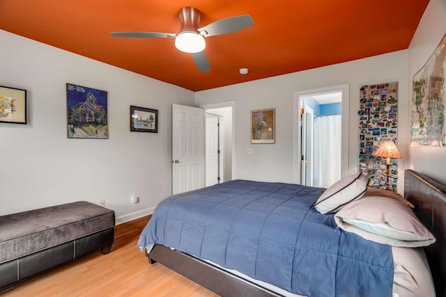 bedroom with ceiling fan and light hardwood / wood-style floors