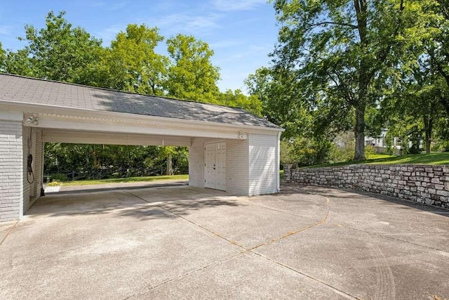 view of car parking featuring a carport